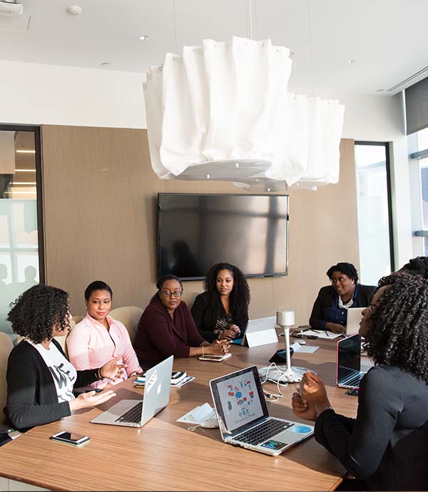 People sitting at a conference table